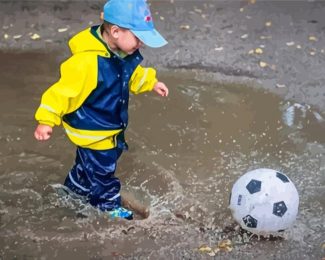 Boy Playing Soccer In Rainy Day Diamond Paintings